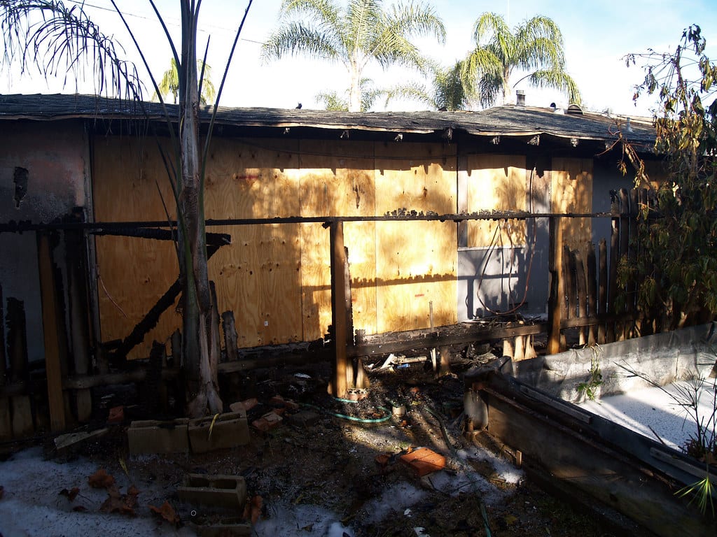 Fire and smoke damage restoration crew at a commercial building