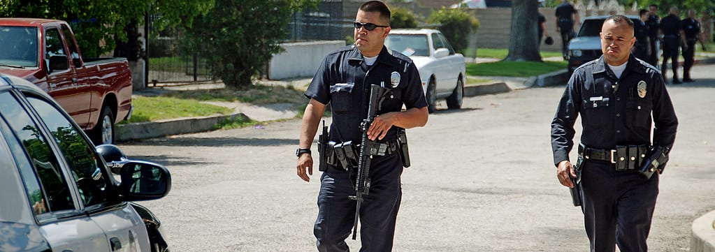 Homicide scene biohazard cleanup crew in protective equipment